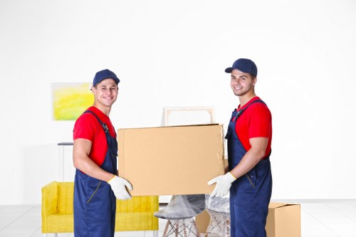 Highgate house removal team loading boxes into a van