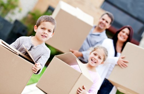 Packed storage boxes and furniture arranged in a Highgate unit