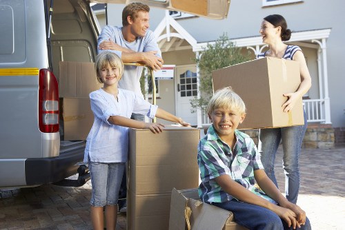 Professional movers handling furniture in Highgate