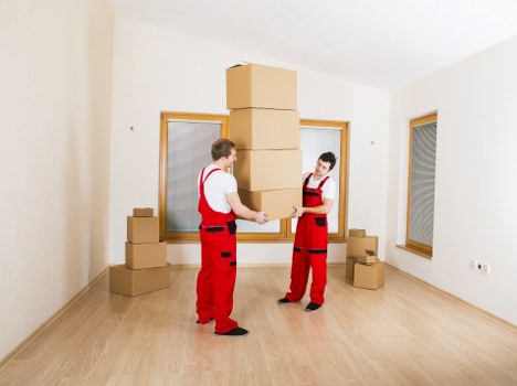 Employee checking storage area risks and housekeeping conditions
